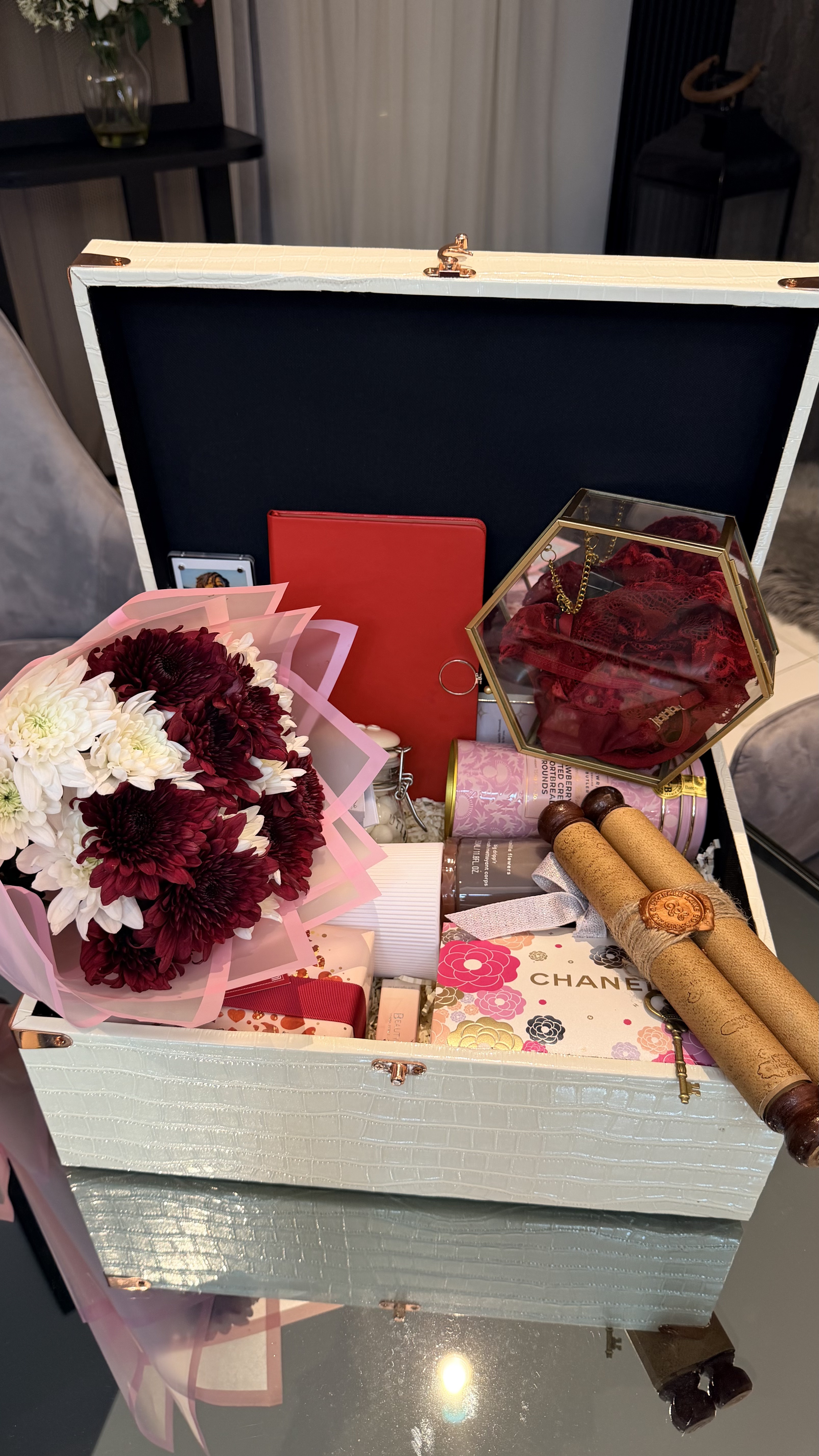 The complete Wife Appreciation presentation — trunk, gift contents and bouquet